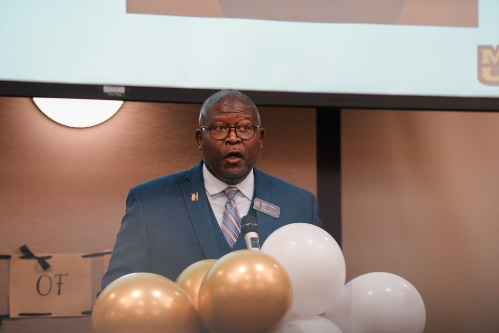 CASE Director Dr. Andre Thorn speaks to graduating CASE and TRiO scholars as the Salute to Excellence ceremony begins.