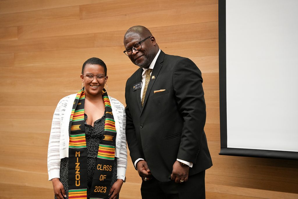Brooks Scholar Nia Martin who is graduating form the Missouri School of Journalism smiles brightly beside CASE Director Dr. Andre Thorn after receiving her Kente Stole. (CASE photos/Braiden Wade)